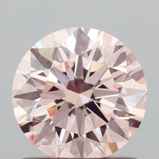 Ideal Loose Diamond - ROUND 0.97ct Fancy Pink VS2: Ideal Loose Diamond - ROUND 0.97ct Fancy Pink VS2 Source: This is a real non-mined Diamond that has been grown in a lab Shape: ROUND Carats: 0.97 Color: Fancy Pink Certification: IGI Video: