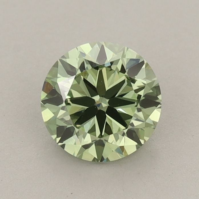 Loose Diamond - ROUND 0.82ct Fancy Vivid Green VS1: Loose Diamond - ROUND 0.82ct Fancy Vivid Green VS1 Source: This is a real non-mined Diamond that has been grown in a lab Shape: ROUND Carats: 0.82 Color: Fancy Vivid Green Certification: IGI Video: