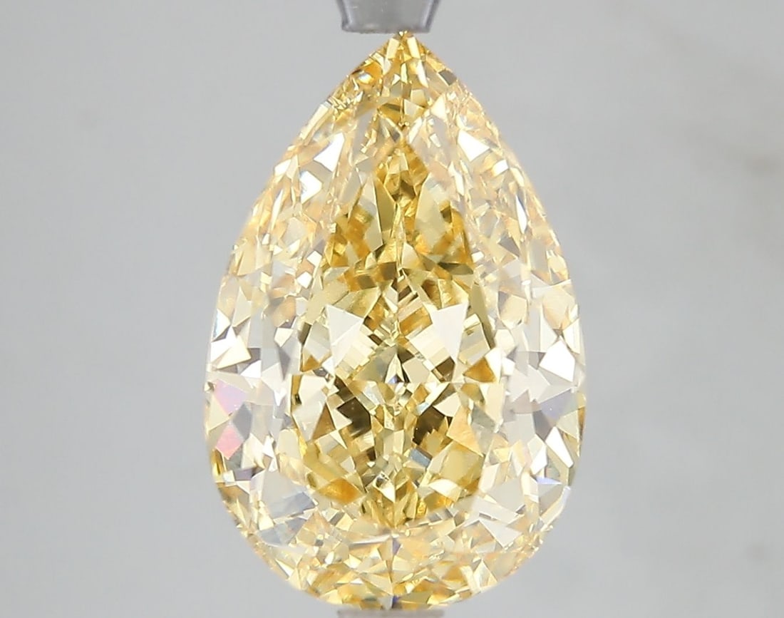 Loose Diamond - PEAR 5.05ct Fancy Vivid Yellow VS1: Loose Diamond - PEAR 5.05ct Fancy Vivid Yellow VS1 Source: This is a real non-mined Diamond that has been grown in a lab Shape: PEAR Carats: 5.05 Color: Fancy Vivid Yellow Certification: IGI Video: