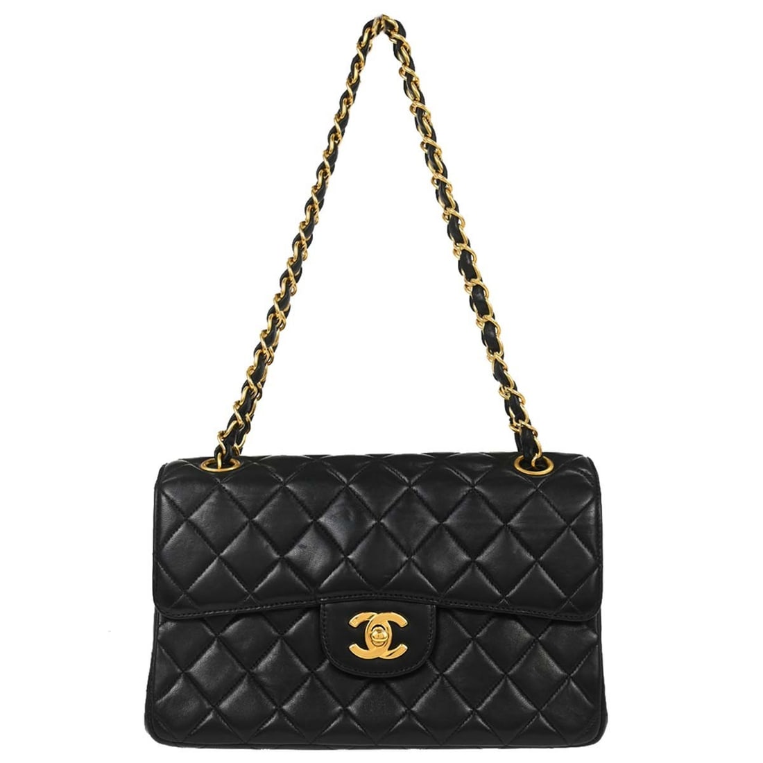 CHANEL Classic Flap black lambskin shoulder bag: CHANEL Classic Flap black lambskin shoulder bag This Chanel Double Sided Classic Flap Shoulder Bag is crafted from black matelasse quilted lambskin leather and features a medium-sized silhouette. The 