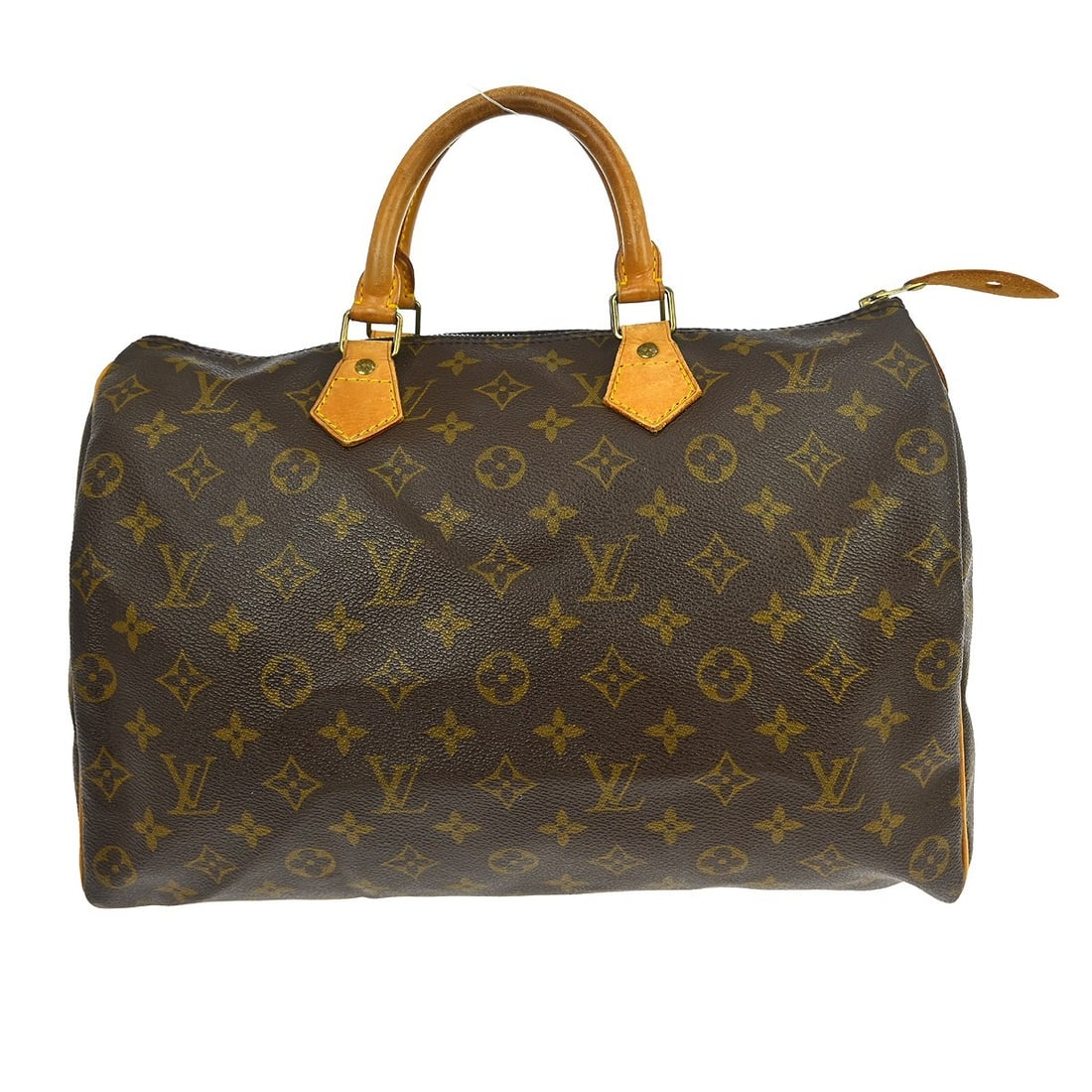 Louis Vuitton Speedy Monogram Canvas Handbag: Louis Vuitton Speedy Monogram Canvas Handbag This Louis Vuitton Speedy Handbag is crafted from the brand's iconic monogram canvas in brown. Designed for unisex use, it features a spacious interior and