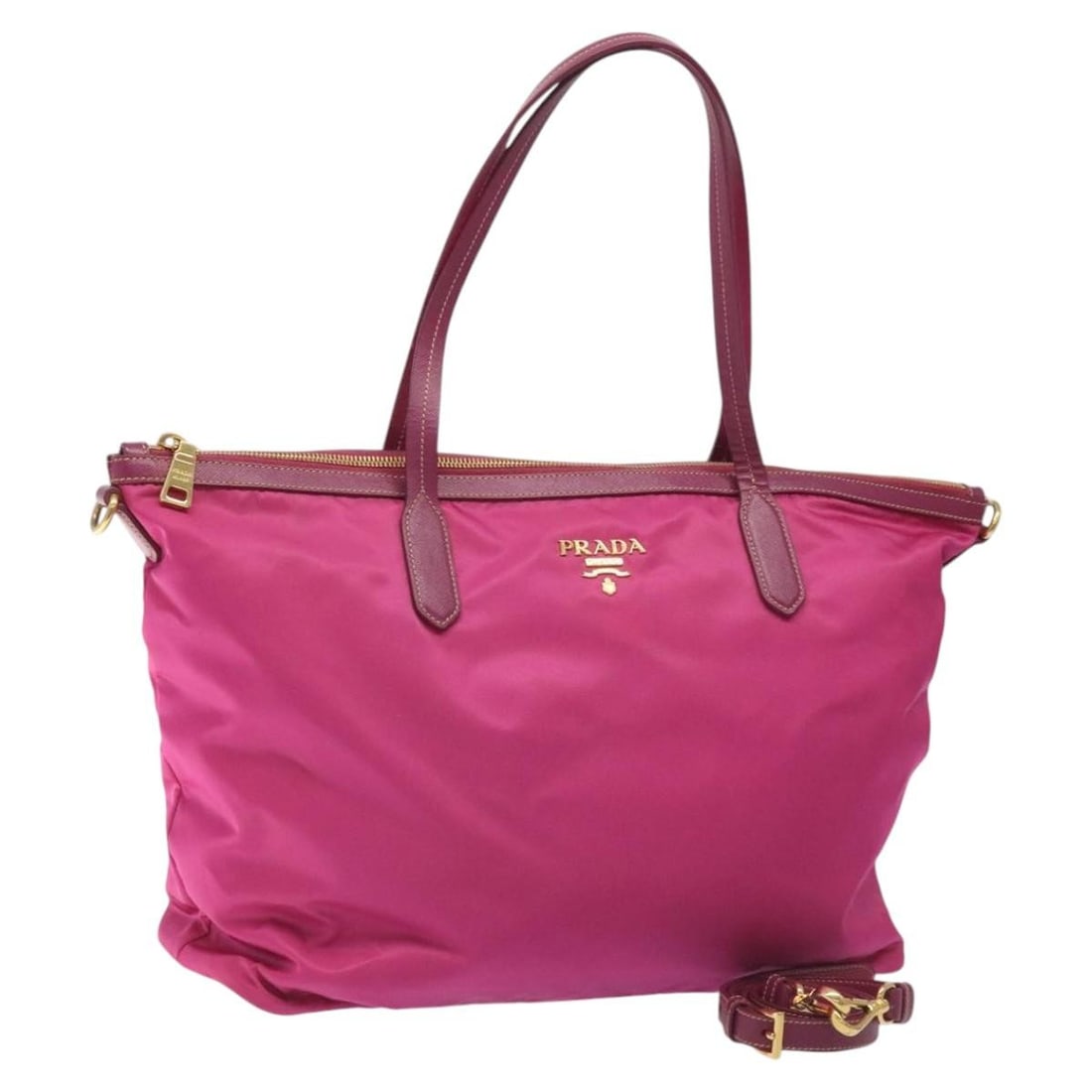 Prada Pink Nylon Two-Way Tote with Gold Accents and Shoulder Strap: Prada Pink Nylon Two-Way Tote with Gold Accents and Shoulder Strap This PRADA tote bag features a pink nylon exterior with gold-tone accents and offers versatile 2-way carrying with both handles and a