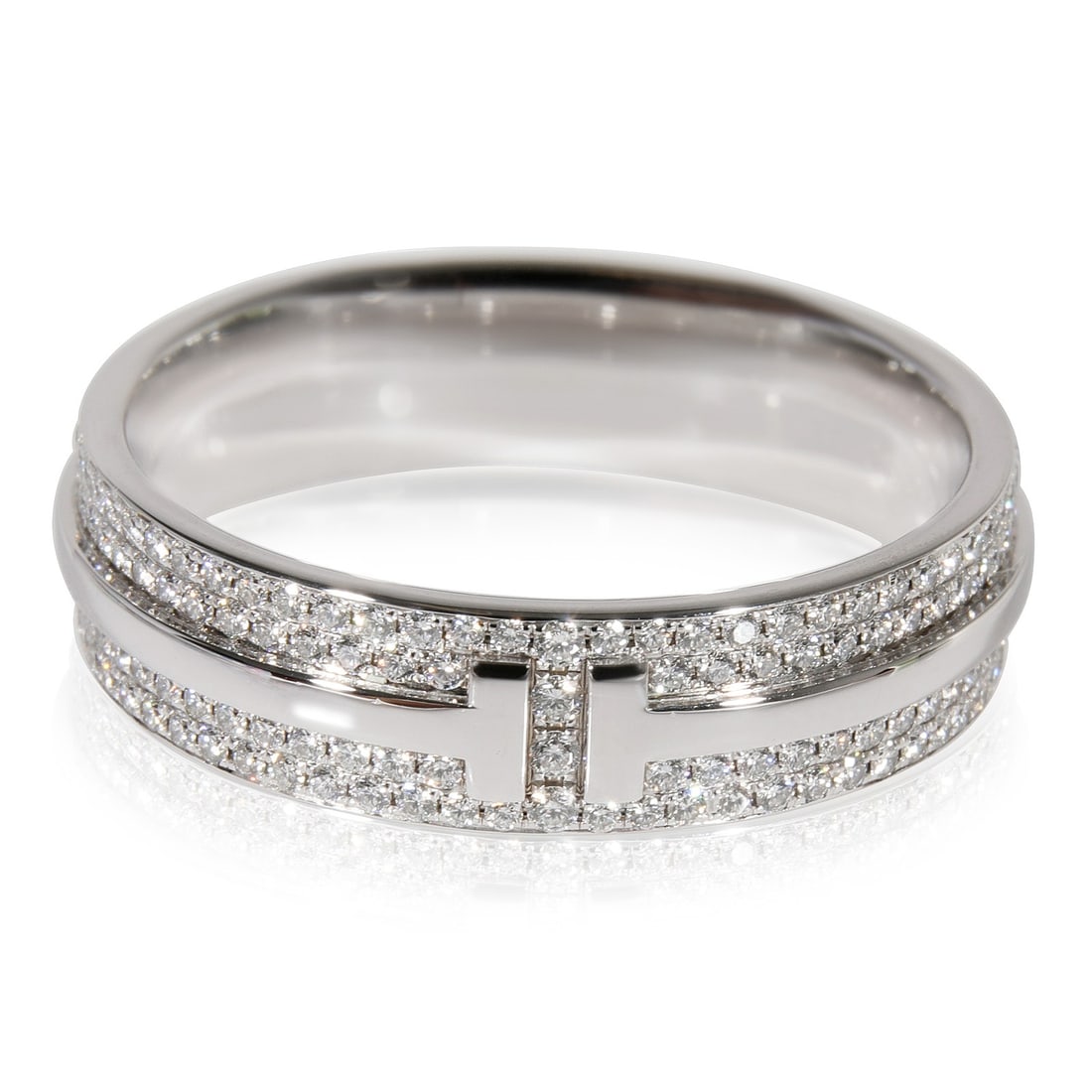 Tiffany T Wide 18k White Gold Diamond Ring 0.57ctw Size 9.75: Tiffany T Wide 18k White Gold Diamond Ring 0.57ctw Size 9.75 This Tiffany & Co. Tiffany T Wide Diamond Ring features a round brilliant diamond set in 18k white gold. The ring showcases a total diamond