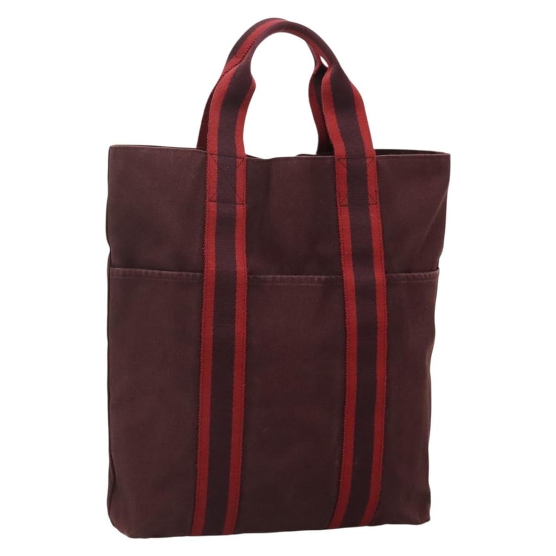 Hermes red canvas Fourre Tout Cabass handbag: Hermes red canvas Fourre Tout Cabass handbag This HERMES Fourre Tout Cabass handbag is crafted from red canvas and made in France. It features a spacious interior suitable for everyday use, with doubl