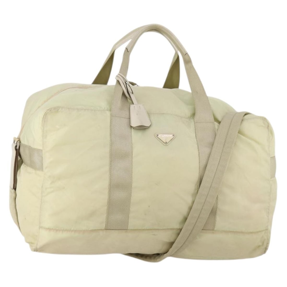 Cream Beige Nylon Boston Bag by PRADA with Padlock and Keys: Cream Beige Nylon Boston Bag by PRADA with Padlock and Keys This is an authentic PRADA Boston Bag in cream and beige nylon, designed for women. The bag is made in Italy and features both a handle and 