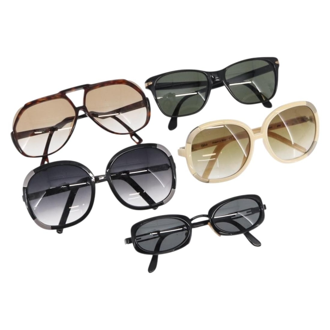 5 Piece Set Chloe Plastic Sunglasses in Black and Beige with Case: 5 Piece Set Chloe Plastic Sunglasses in Black and Beige with Case Set of five Chloe sunglasses in black and beige plastic, made in Japan. Includes a sunglass case. The set shows heavy use with surface
