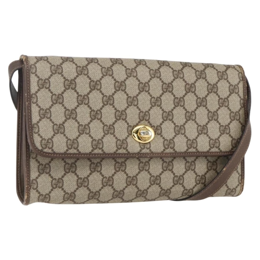 Beige GG Supreme PVC Shoulder Bag by Gucci Italy: Beige GG Supreme PVC Shoulder Bag by Gucci Italy This is a Gucci GG Supreme shoulder bag crafted in beige and gold PVC leather and GG canvas. The bag features a shoulder strap with a drop of approxima