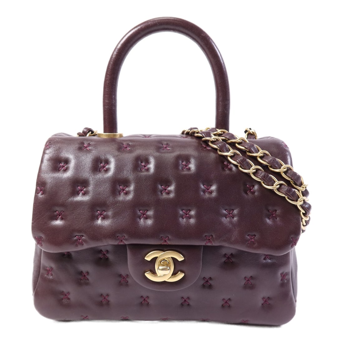 CHANEL CoCo Handle Purple Lambskin 2 Way Shoulder Bag GHW: CHANEL CoCo Handle Purple Lambskin 2 Way Shoulder Bag GHW This CHANEL 2-way shoulder bag features luxurious purple lambskin leather with the iconic CC detail and gold-tone hardware. Designed for versa