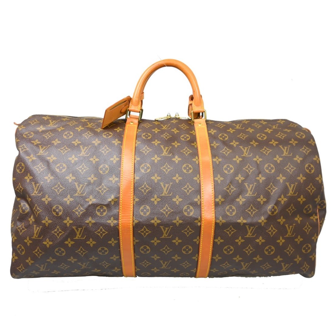 Louis Vuitton Keepall 60 Monogram Duffle Bag: Louis Vuitton Keepall 60 Monogram Duffle Bag This Louis Vuitton Keepall 60 travel handbag features the iconic monogram canvas with leather accents. Designed for travel, this extra-large duffle bag inc