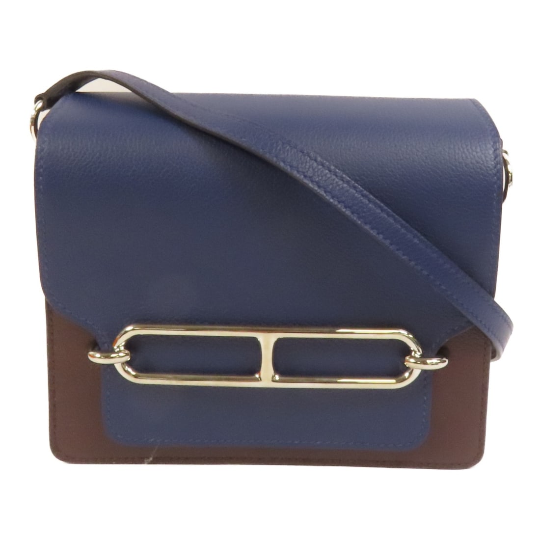Hermes Mini Roulis Calfskin Shoulder Bag Rouge Sellier Bleu Saphir PHW: Hermes Mini Roulis Calfskin Shoulder Bag Rouge Sellier Bleu Saphir PHW This Hermes Mini Roulis shoulder bag is crafted from Evercolor calfskin leather in a Rouge Sellier and Bleu Saphir color combinat