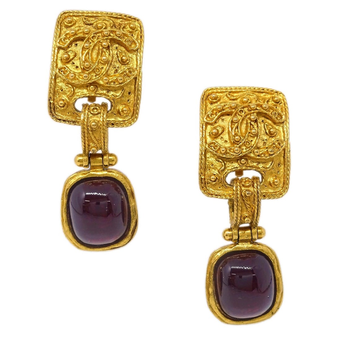 Gripoix Dangle Clip-On Earrings by Chanel Gold Tone 94A France: Gripoix Dangle Clip-On Earrings by Chanel Gold Tone 94A France These Chanel Gripoix dangle earrings feature a clip-on closure and are crafted in a gold tone. Designed in a dangle style, they originate