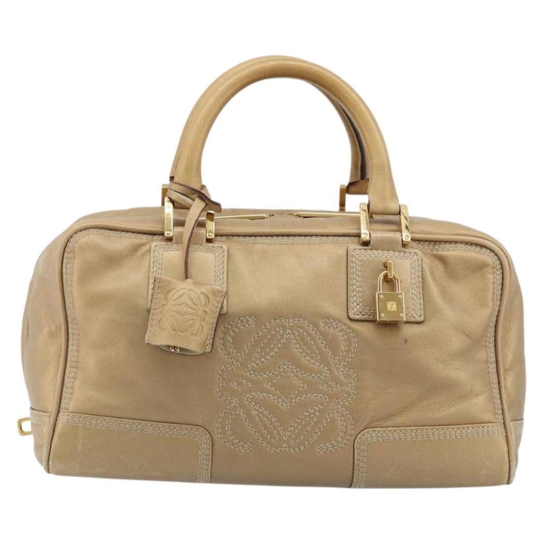 Loewe Amazona Gold Leather Handbag with Padlock and Keys: Loewe Amazona Gold Leather Handbag with Padlock and Keys This Loewe Amazona Bag is crafted from gold-colored leather and designed for women. It features a structured silhouette with dual handles, meta