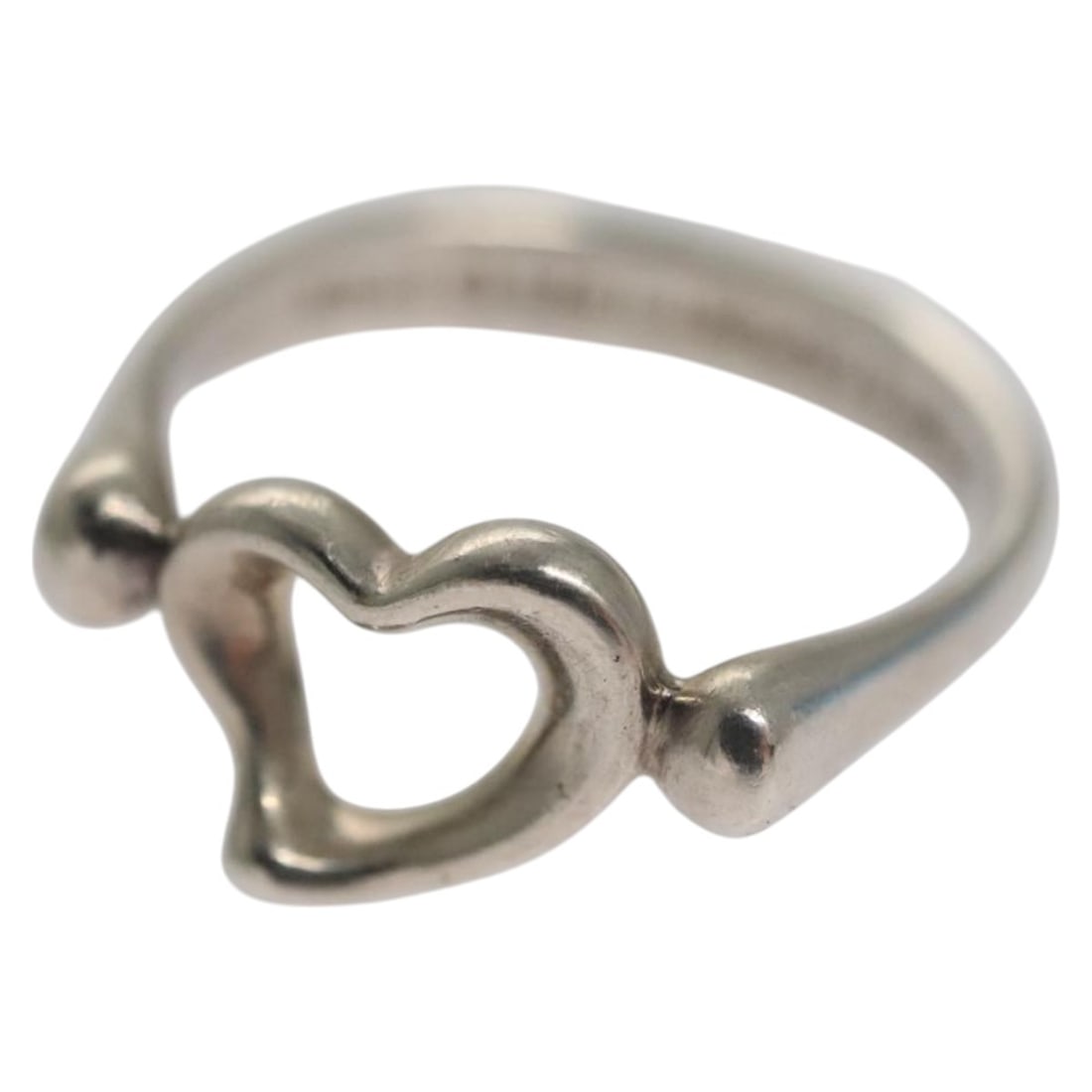 Tiffany Open Heart Silver Ring for Women Made in Spain: Tiffany Open Heart Silver Ring for Women Made in Spain This Tiffany & Co. Open Heart ring is crafted from Ag925 silver and designed for women. Featuring a classic open heart motif, the ring is made in