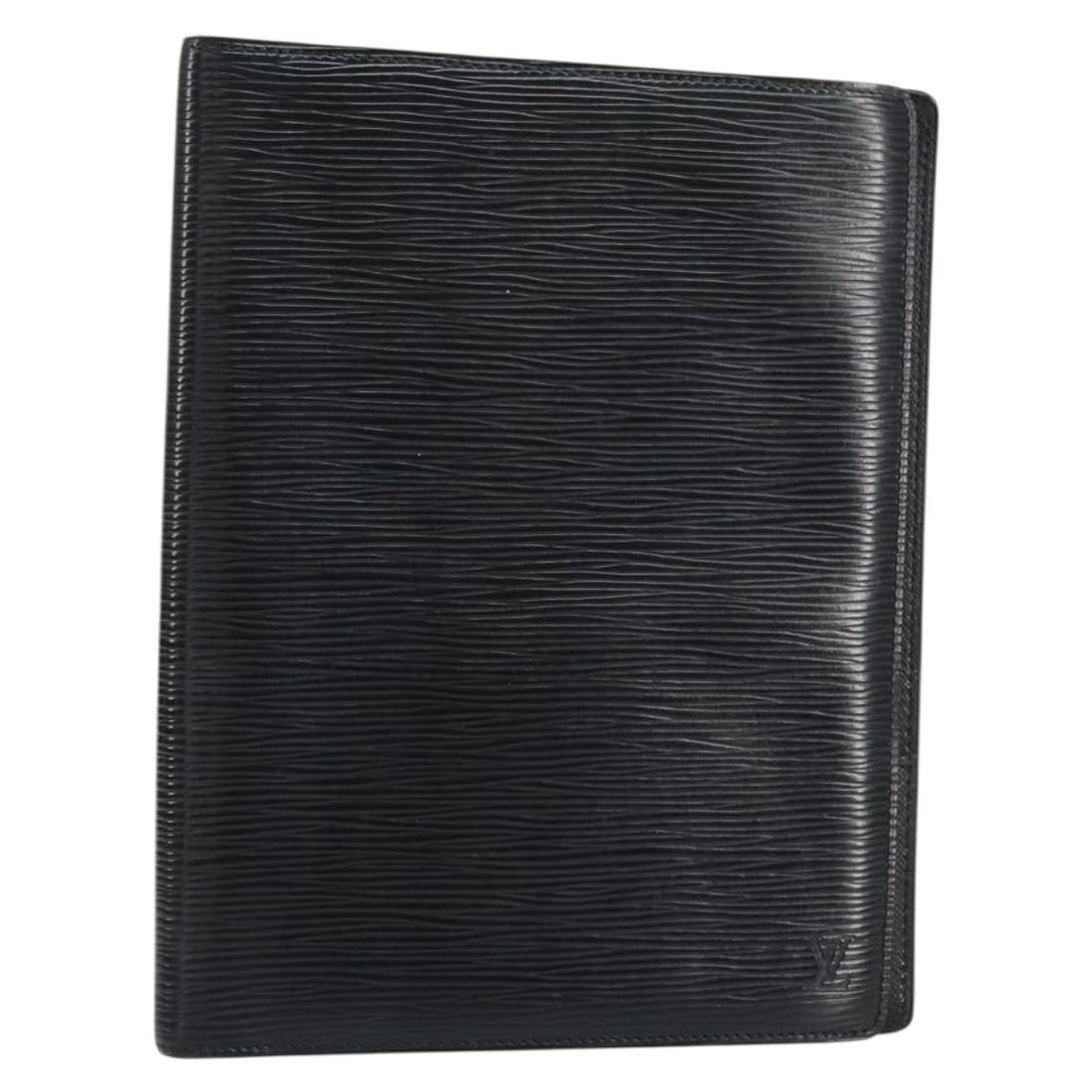 LOUIS VUITTON Black Epi Leather Agenda Bureau Day Planner Cover: LOUIS VUITTON Black Epi Leather Agenda Bureau Day Planner Cover Enhance your organization with this authentic Louis Vuitton Epi Agenda Bureau Day Planner Cover in a sophisticated black finish. Crafted