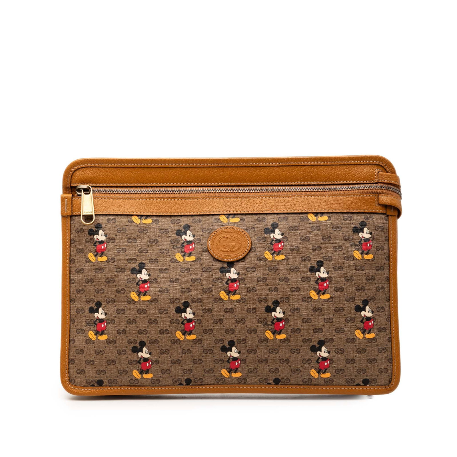 Disney Mickey Mouse Micro GG Supreme Brown Canvas Clutch by Gucci: Disney Mickey Mouse Micro GG Supreme Brown Canvas Clutch by Gucci This Gucci Disney Micro GG Supreme Mickey Mouse clutch features a coated canvas body with leather trim, a front zip closure, and inter