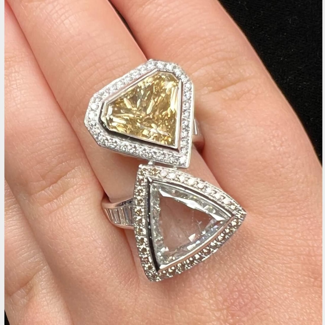 EGL Certified Platinum Two-Stone Diamond Ring 5.04 Ct Trillion 3.96 Ct Champagne: EGL Certified Platinum Two-Stone Diamond Ring 5.04 Ct Trillion 3.96 Ct Champagne This exquisite platinum ring features an EGL Certified two-stone design, showcasing a stunning 5.04 Ct trillion diamond