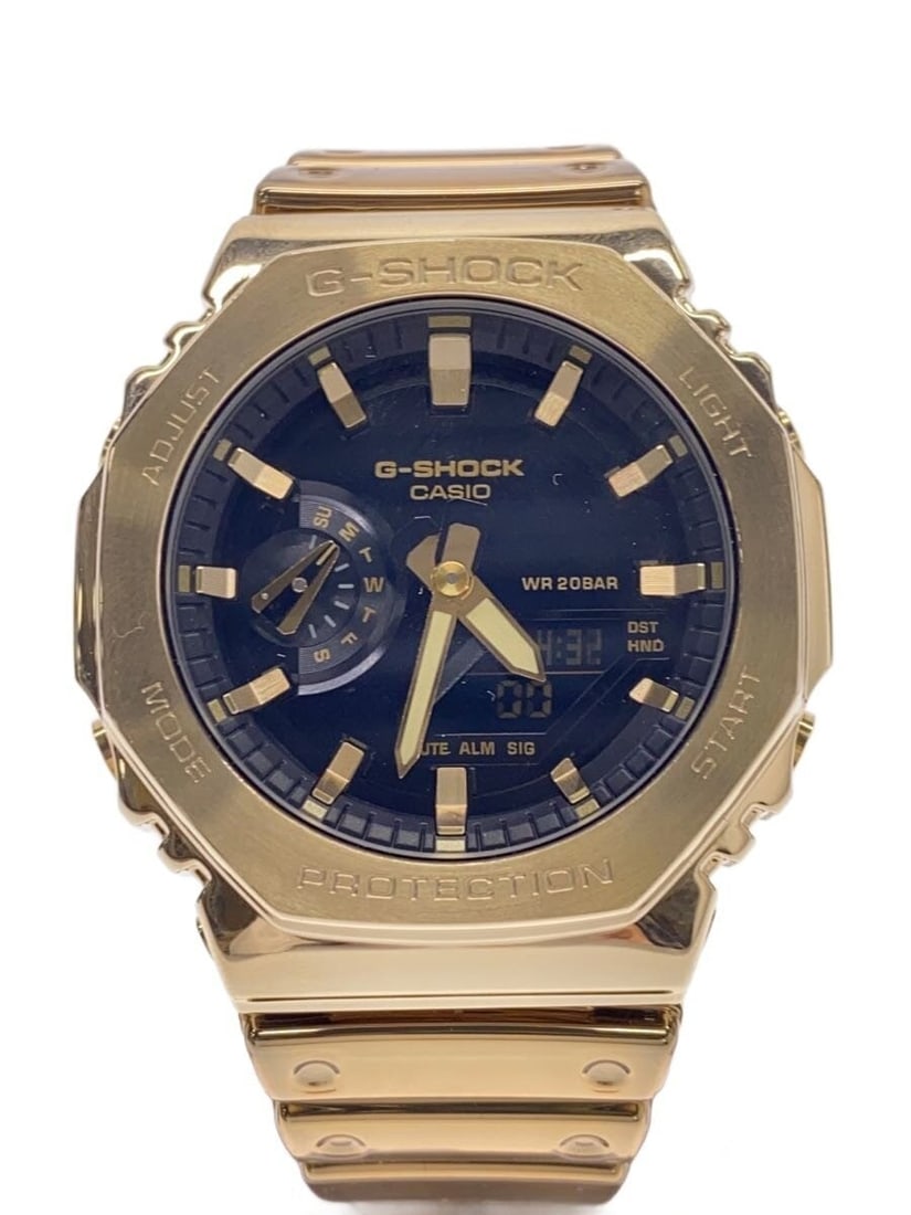 Casio G Shock GM-2100YMG-9AJF Gold Men's Wristwatch: Casio G Shock GM-2100YMG-9AJF Gold Men's Wristwatch This CASIO G-SHOCK GM-2100YMG-9AJF men's wristwatch features a gold-tone case and is crafted in Japan. The watch is in slightly used condition, offe