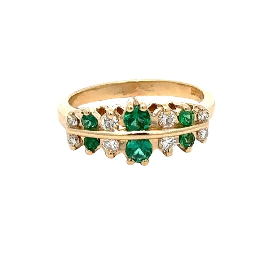 14K Yellow Gold Dual Row Diamond Emerald Band Ring 0.56ctw: 14K Yellow Gold Dual Row Diamond Emerald Band Ring 0.56ctw Elevate your jewelry collection with this exquisite 14K Yellow Gold Round Brilliant Channel Set Diamond & Emerald Dual Row Band Ring. The rin