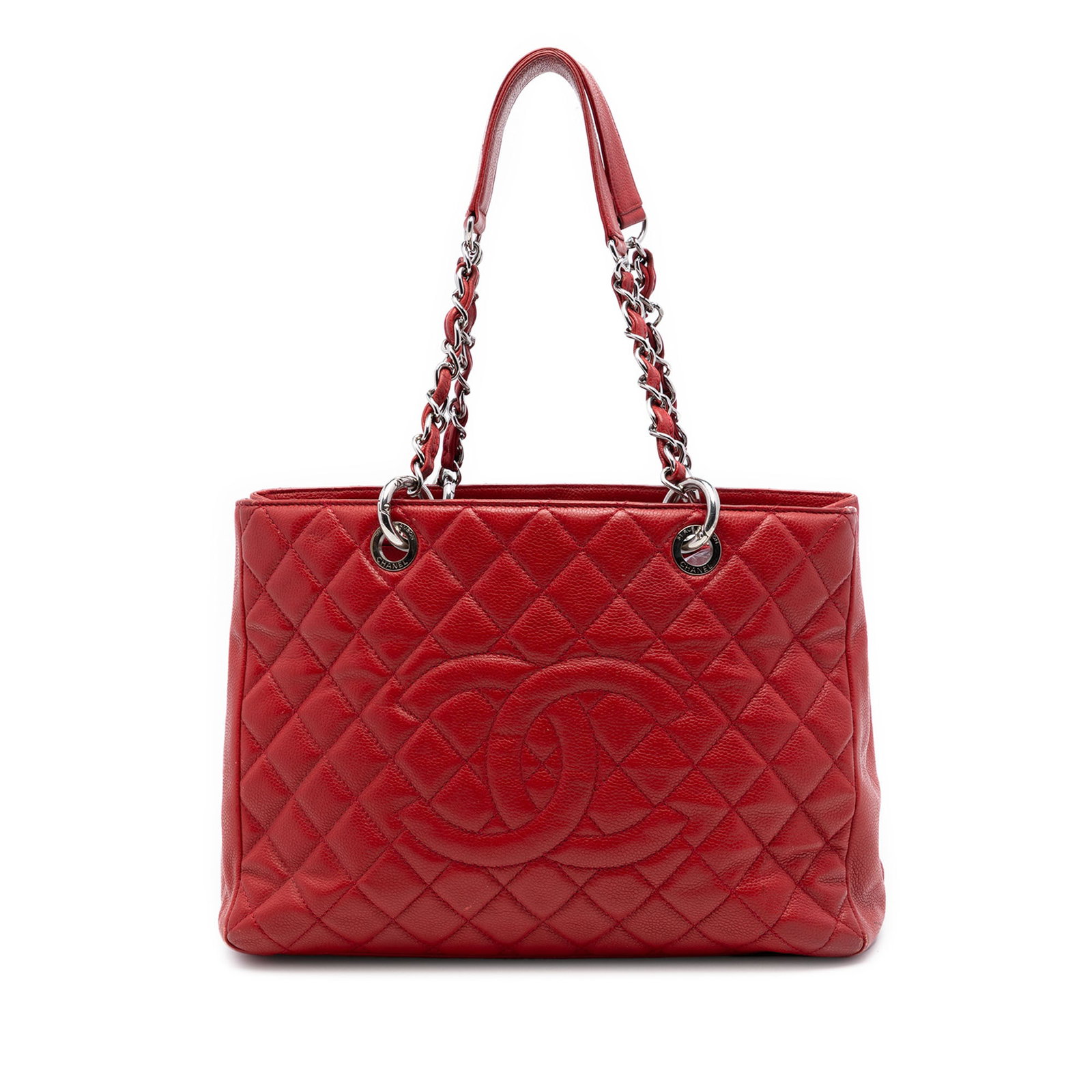 Red Chanel Caviar Leather Grand Shopping Tote: Red Chanel Caviar Leather Grand Shopping Tote This Chanel Caviar Grand Shopping Tote features a quilted caviar leather exterior in red, complemented by leather-woven chain straps. The bag is designed 