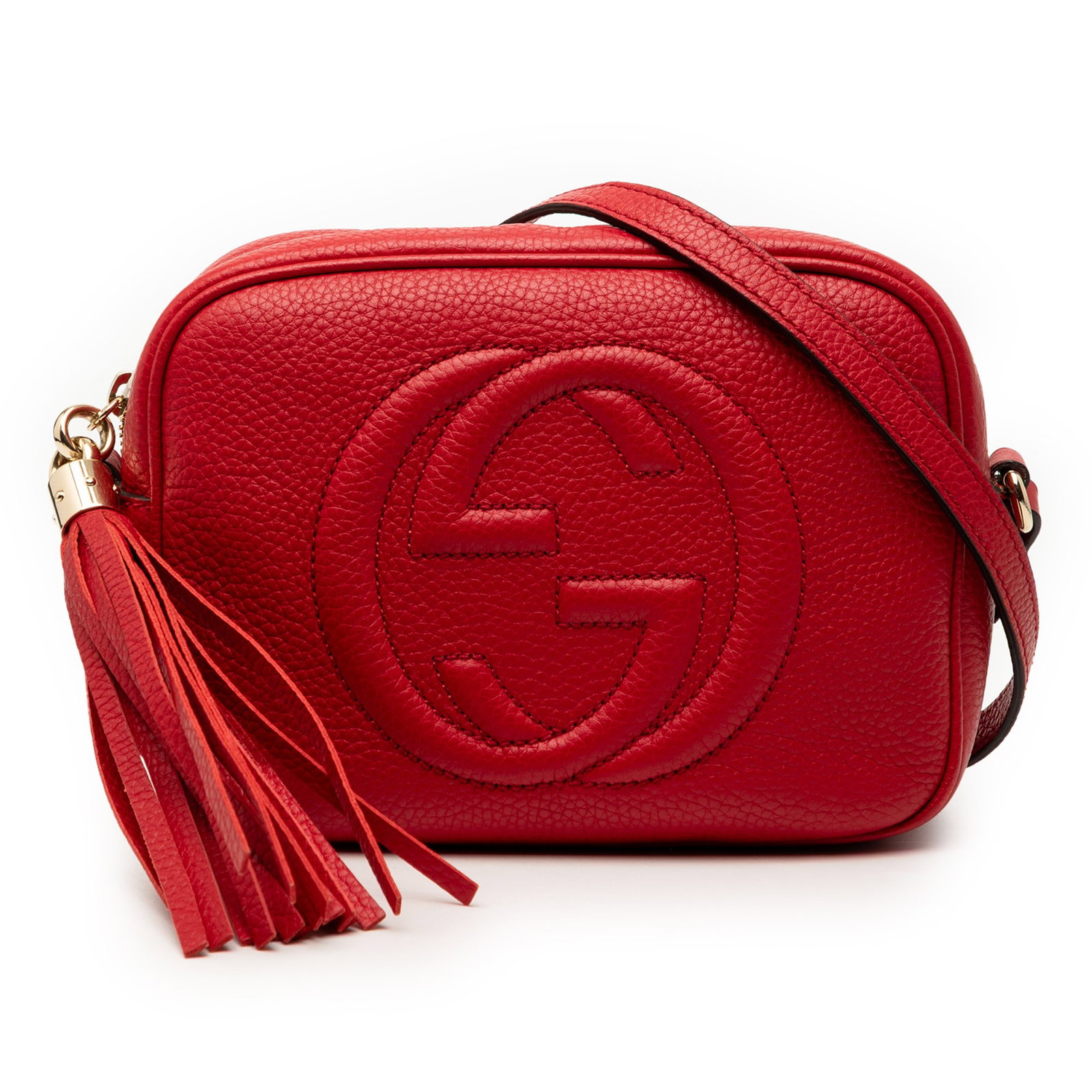 Red Soho Disco Leather Crossbody Bag by Gucci: Red Soho Disco Leather Crossbody Bag by Gucci This Gucci Soho Disco crossbody bag is crafted from leather and features an adjustable flat leather strap, a signature tassel detail, a top zip closure, a