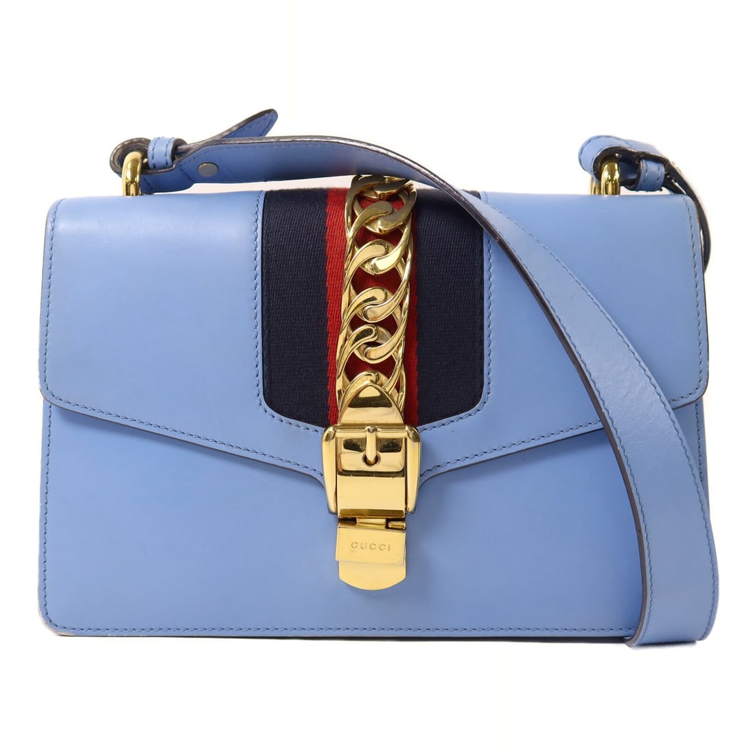 Blue Calfskin Sylvie Shoulder Bag by Gucci with Gold Hardware: Blue Calfskin Sylvie Shoulder Bag by Gucci with Gold Hardware This Gucci Sylvie shoulder bag is crafted from blue calfskin leather and features signature GG hardware. Designed for women, it offers a s