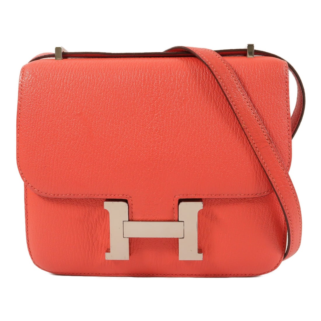 HERMES Constance Mini Chevre Leather Shoulder Bag Rose Jaipur: HERMES Constance Mini Chevre Leather Shoulder Bag Rose Jaipur This HERMES Constance Mini shoulder bag features a compact and elegant design crafted from pink lambskin leather. With its structured silh