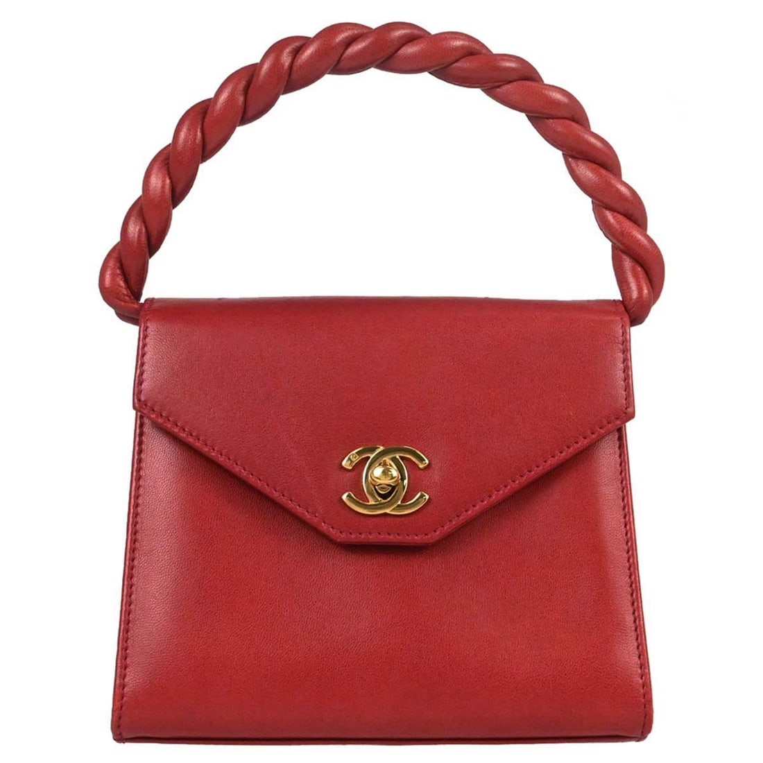 CHANEL red lambskin mini top handle bag twist closure: CHANEL red lambskin mini top handle bag twist closure This Chanel mini handbag is crafted from red lambskin leather and features a top twist handle and a turn lock closure. Designed for casual occasio