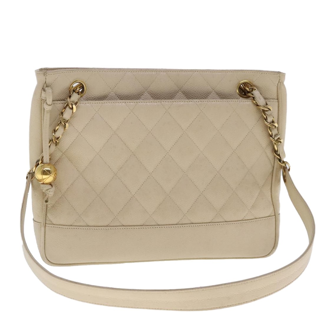 Chanel Vintage Quilted Caviar Leather Shoulder Bag: Chanel Vintage Quilted Caviar Leather Shoulder Bag This Chanel Vintage Slit Pocket Shoulder Bag is crafted from quilted beige caviar leather and features a classic shoulder bag silhouette. The bag inc