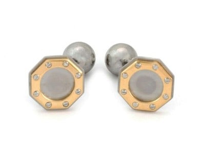Cartier Santos cufflinks stainless steel 18k yellow gold octagonal screw motif: Cartier Santos cufflinks stainless steel 18k yellow gold octagonal screw motif These authentic Cartier Santos cufflinks feature an octagonal design crafted from stainless steel with 18k yellow gold ac