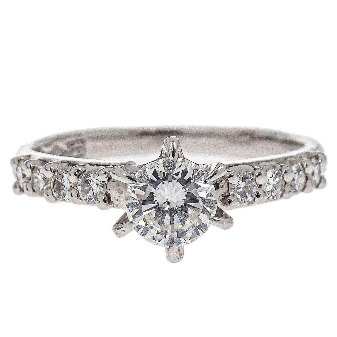 Platinum Pt900 Diamond Ring in Silver Tone Size 48: Platinum Pt900 Diamond Ring in Silver Tone Size 48 This vintage ring features a round diamond set in platinum with a Pt900 purity. The ring is silver in color and is size #48. It is in very good pre-o