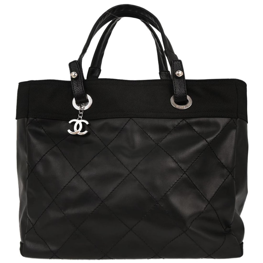 Chanel Black Leather Paris-Biarritz GM Tote Handbag with Zip Closure: Chanel Black Leather Paris-Biarritz GM Tote Handbag with Zip Closure Elevate your accessory collection with this exquisite Chanel Black Leather Paris-Biarritz GM Tote Handbag. Crafted with a sophistic