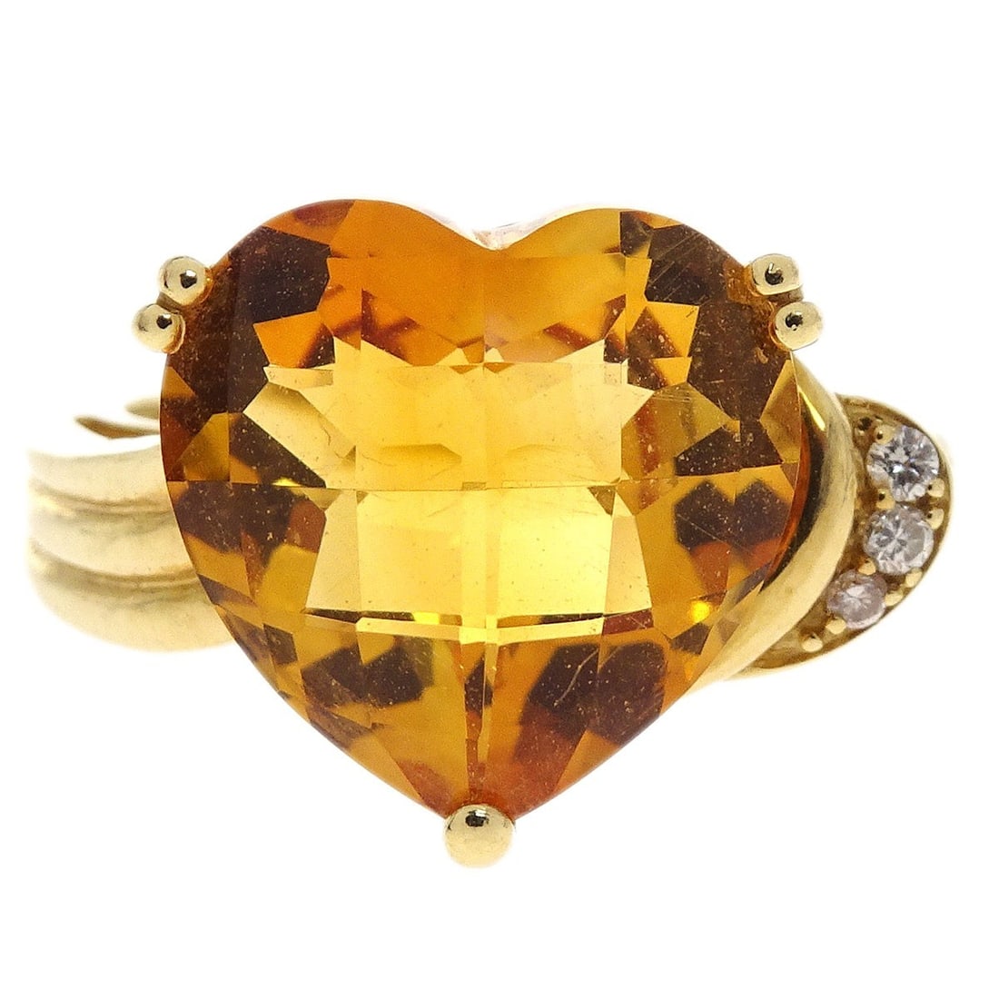 18K Gold Vintage Citrine and Diamond Ring Size 52: 18K Gold Vintage Citrine and Diamond Ring Size 52 This vintage ring features a round citrine as the main stone, accented with diamonds. Crafted in 18K gold, it is a size 52 and is in very good conditi