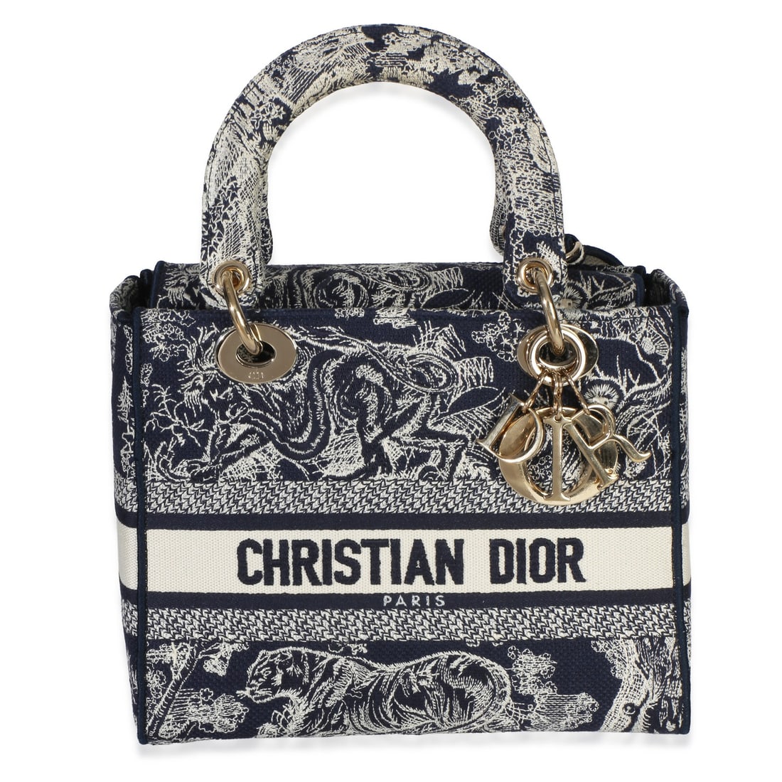 Christian Dior Medium Lady D-Lite Navy Canvas Tote: Christian Dior Medium Lady D-Lite Navy Canvas Tote This Christian Dior Medium Lady D-Lite handbag features navy blue canvas with intricate Toile De Jouy embroidery. Designed for versatility, it can be