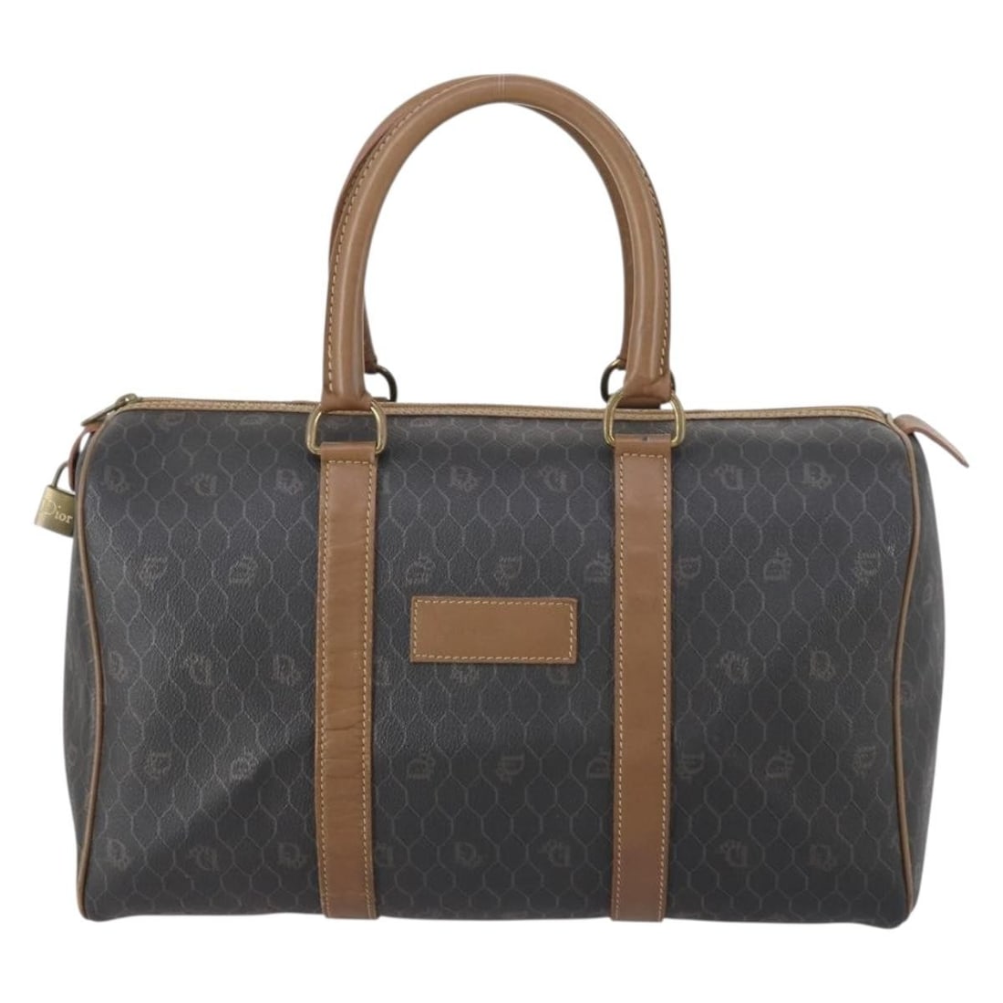 Black Canvas and Leather Boston Bag by Christian Dior Vintage: Black Canvas and Leather Boston Bag by Christian Dior Vintage This vintage Christian Dior Honeycomb Boston bag features black canvas and leather construction. It measures 37cm x 22cm x 20cm and is des