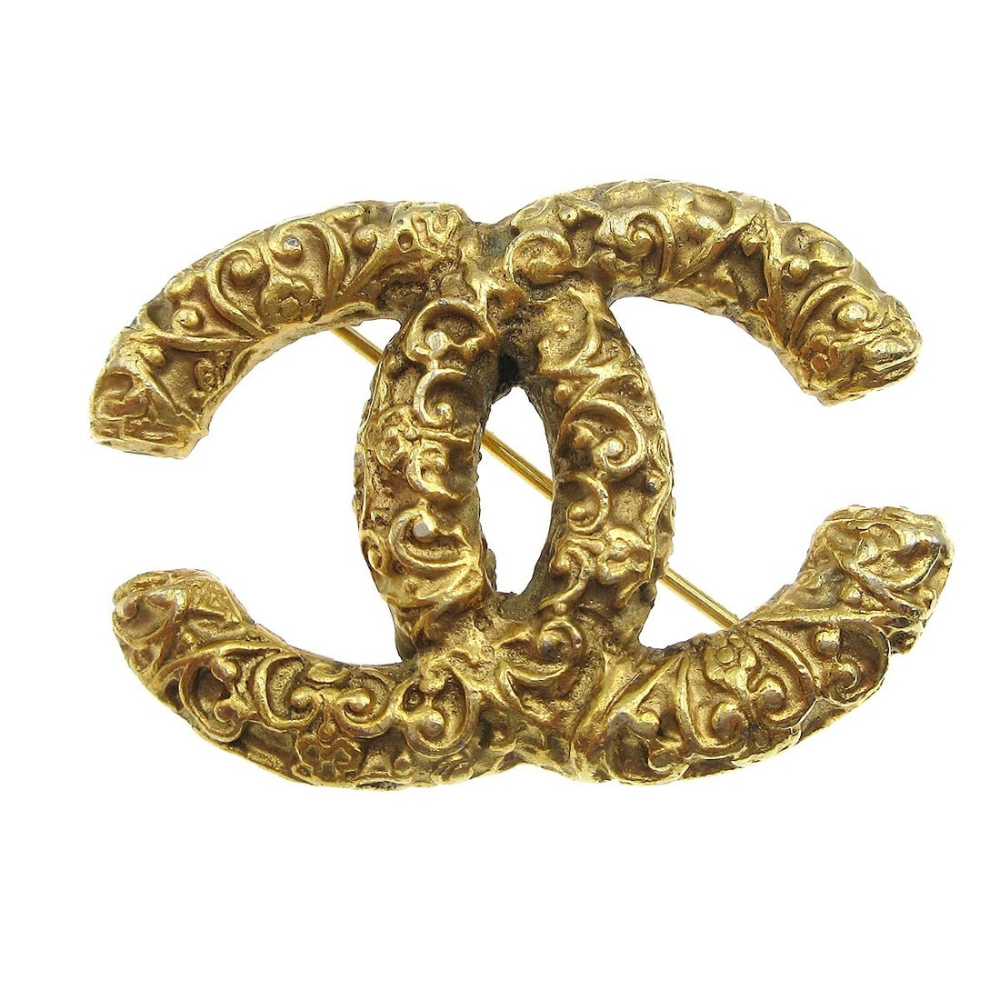 Gold Plated Brooch with CC Motif by Chanel 93A: Gold Plated Brooch with CC Motif by Chanel 93A This Chanel CC brooch pin is crafted in gold-plated metal and features the iconic interlocking CC logo. Made in France, the brooch has a gold color and m