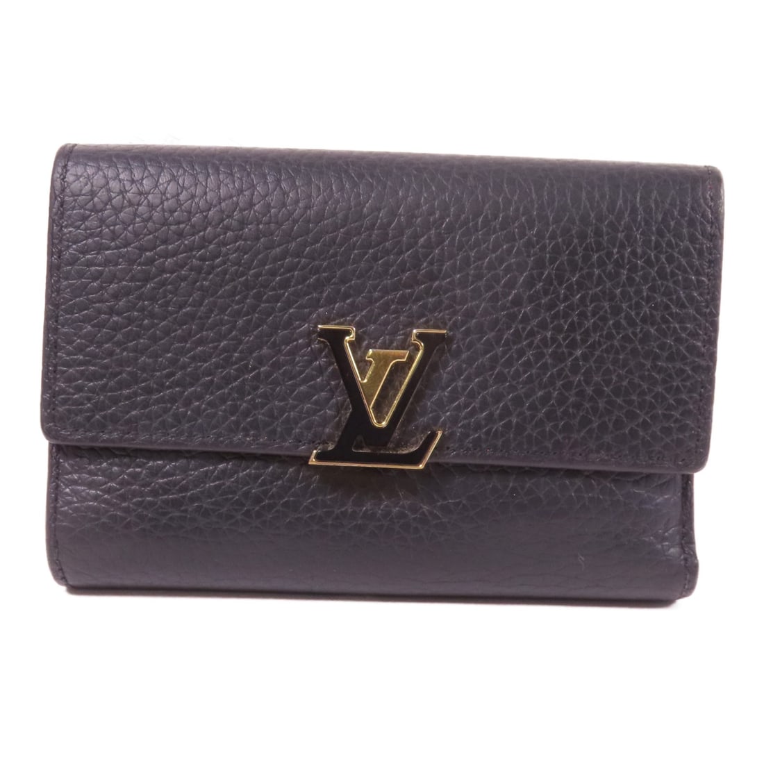 Louis Vuitton Capucines Black Trifold Wallet Taurillon Leather Gold Hardware: Louis Vuitton Capucines Black Trifold Wallet Taurillon Leather Gold Hardware This Louis Vuitton Capucines compact trifold wallet features a sleek black design crafted from Taurillon calfskin leather. 