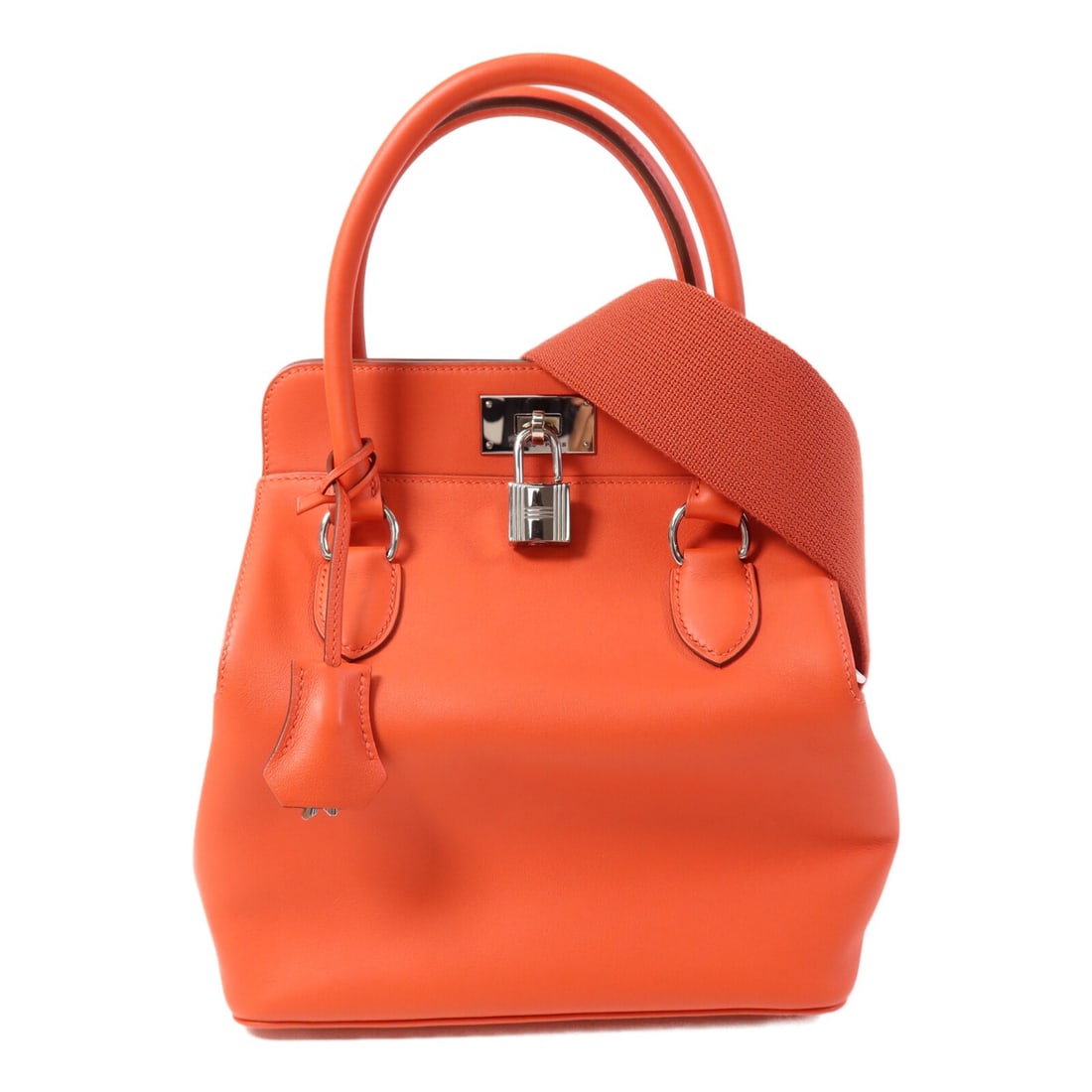 Hermes Toolbox 20 Orange Swift Calfskin Shoulder Bag with Palladium Hardware: Hermes Toolbox 20 Orange Swift Calfskin Shoulder Bag with Palladium Hardware Hermes Tool Box 20 two-way shoulder bag crafted from Swift leather in an orange shade known as Capucine. Features calfskin 