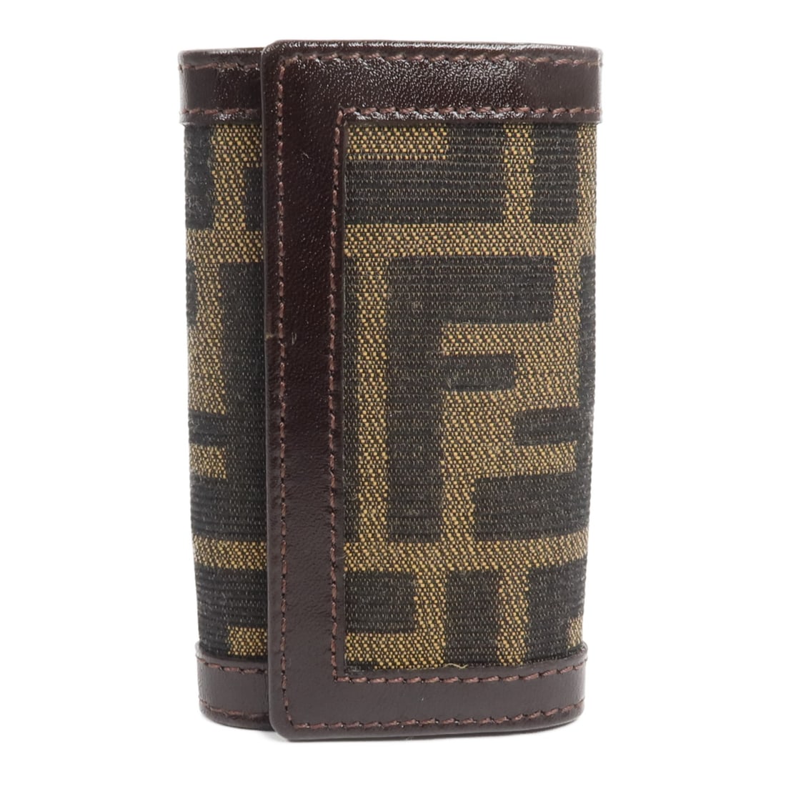 FENDI Brown Canvas 6 Key Holder Case 10163: FENDI Brown Canvas 6 Key Holder Case 10163 This FENDI key holder features a sleek brown canvas design, crafted for women. Made in Italy, it offers secure organization for up to six keys, combining pra