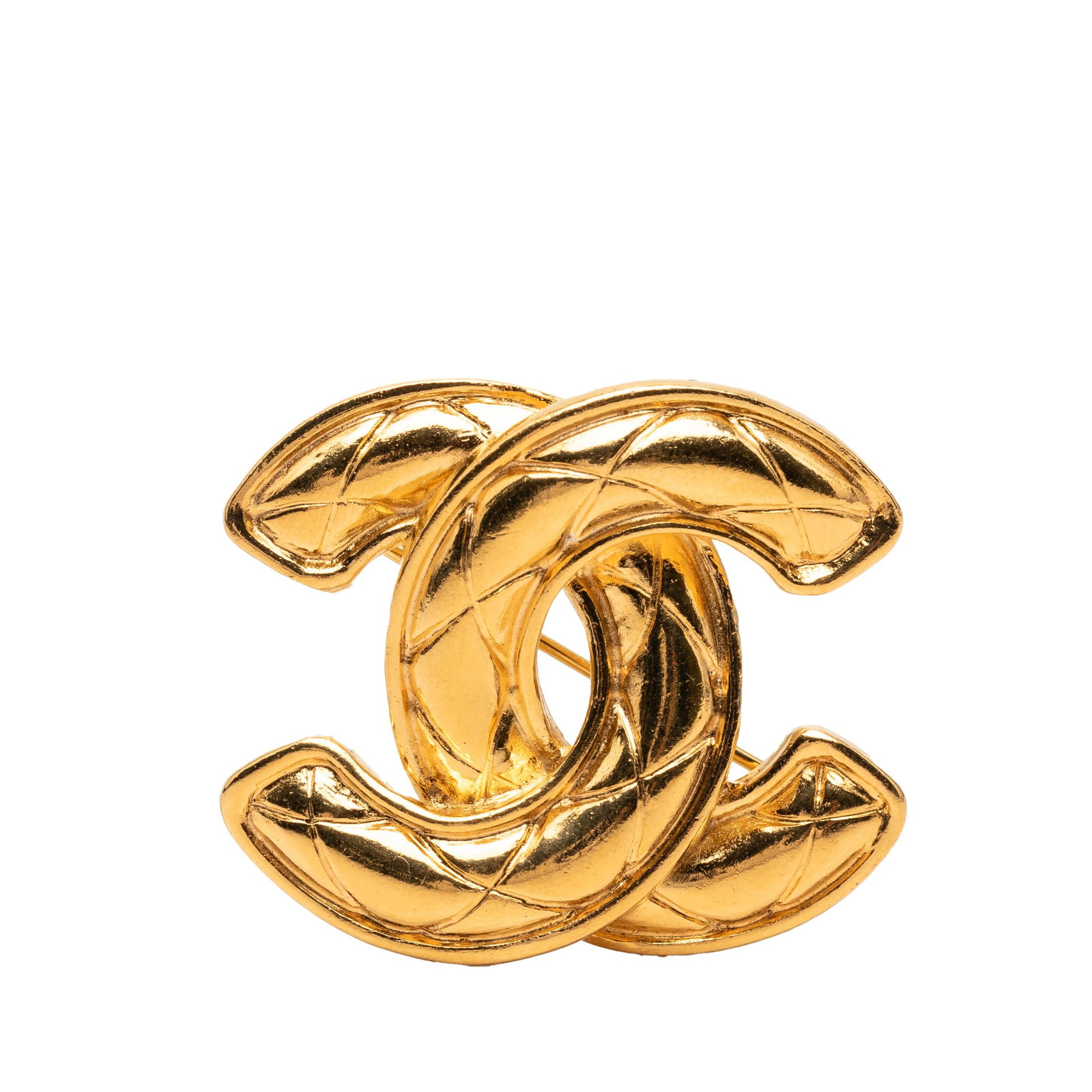 Chanel CC Quilted Gold Tone Metal Brooch Pin: Chanel CC Quilted Gold Tone Metal Brooch Pin This Chanel CC Quilted Gold Plated Pin Brooch showcases a gold-tone metal body with a quilted design, featuring a secure back pin closure. The brooch is cr