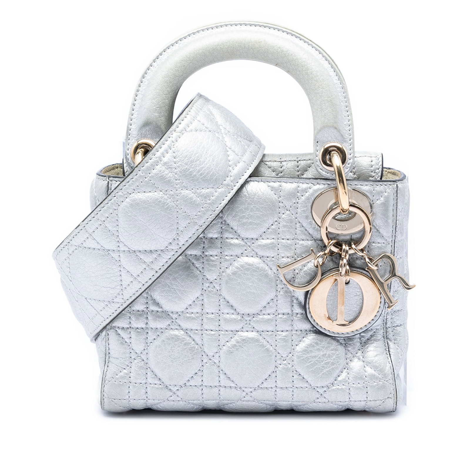 Dior Mini Metallic Cannage Lady Dior Silver Leather Bag: Dior Mini Metallic Cannage Lady Dior Silver Leather Bag This Mini Metallic Calfskin Cannage Supple Lady Dior bag features a quilted calfskin leather body in silver, flat leather top handles, a detacha