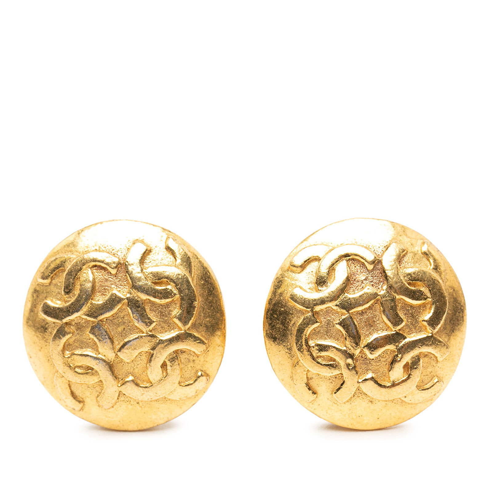 Chanel CC Gold Plated Round Clip On Earrings: Chanel CC Gold Plated Round Clip On Earrings These Chanel CC round clip-on earrings feature gold-plated metal bodies with back clip closures. Originating from France, these costume earrings are design