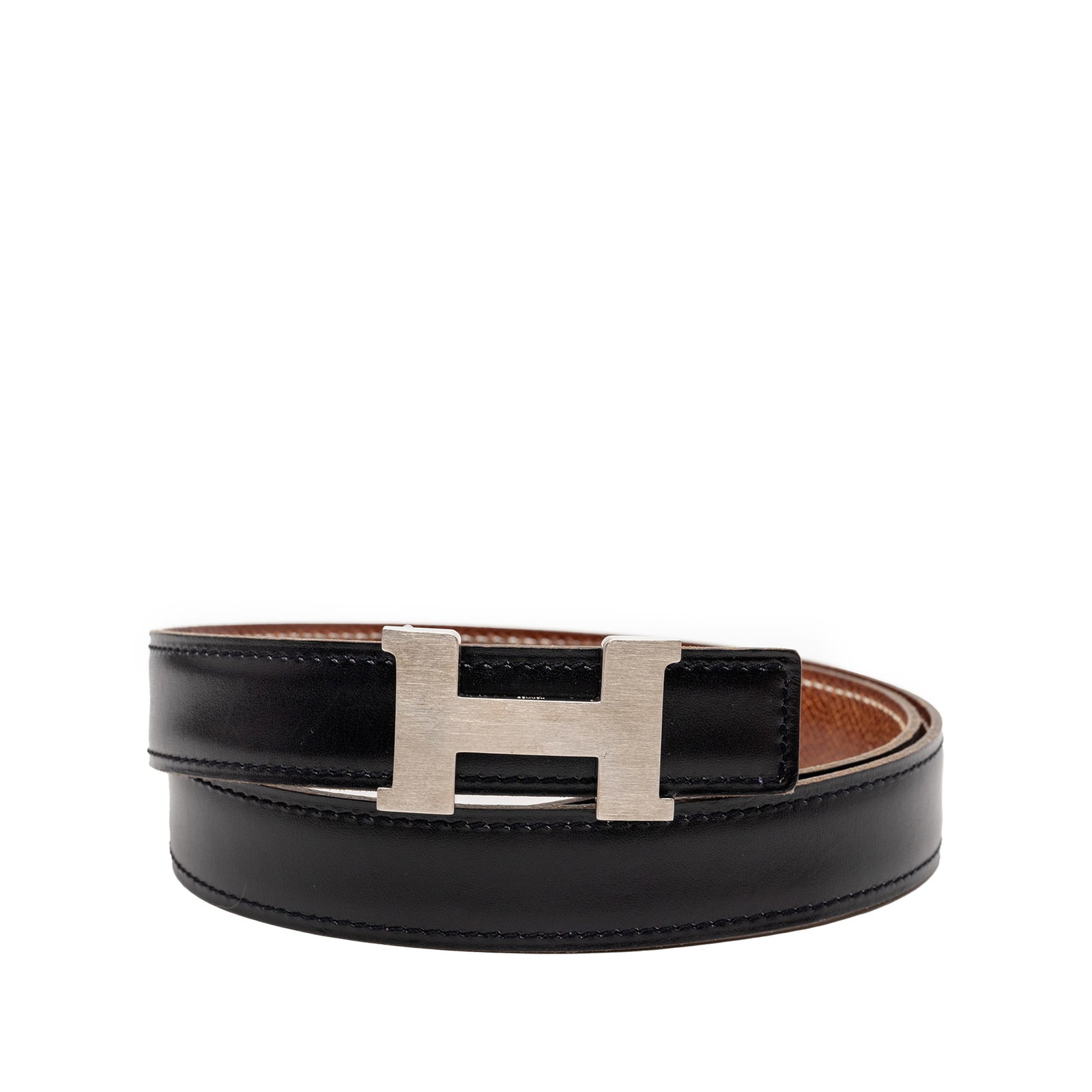 Hermes Constance H reversible leather belt black size 75: Hermes Constance H reversible leather belt black size 75 This Hermes Constance H Reversible Belt is crafted from high-quality Swift and Epsom leather, featuring a flat waist strap in black and a silve