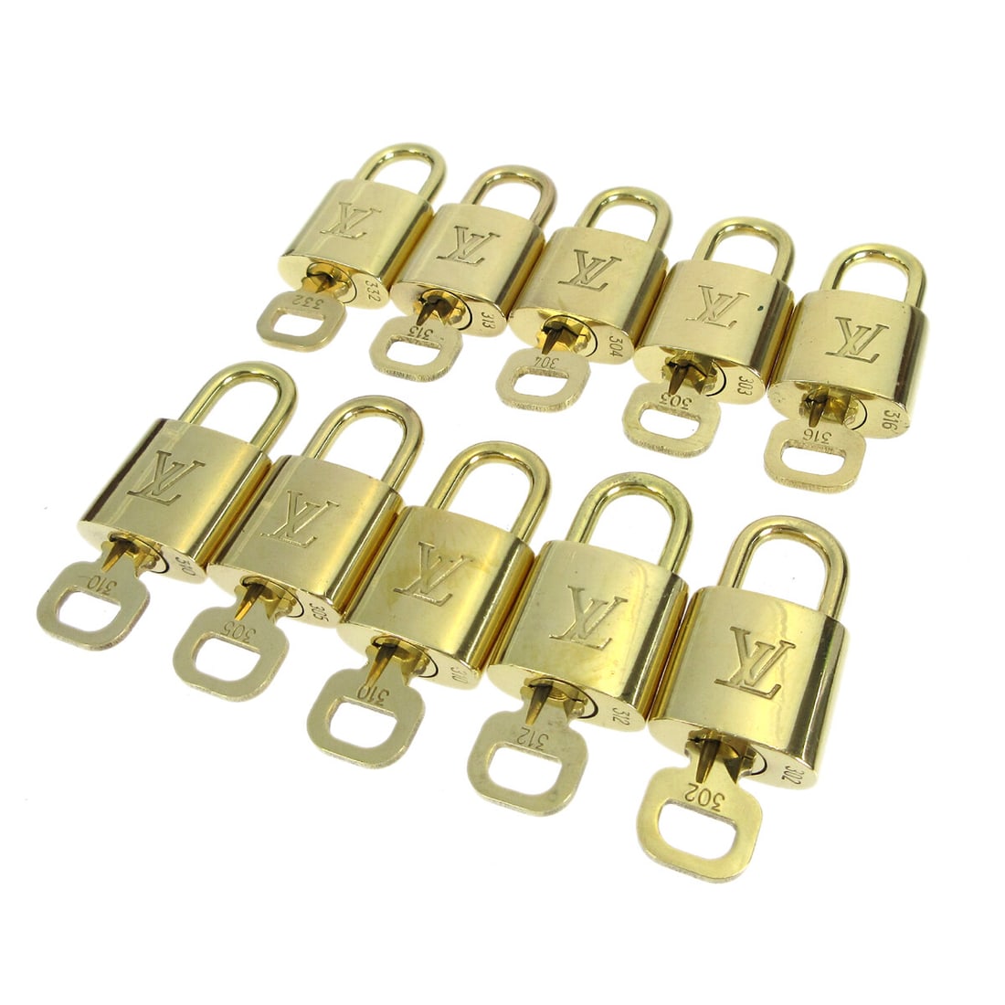 Louis Vuitton gold padlock charm set 10 pieces: Louis Vuitton gold padlock charm set 10 pieces This is a set of ten Louis Vuitton gold-colored padlocks with matching keys, designed as bag accessories or charms. Made in France, these unisex padlocks