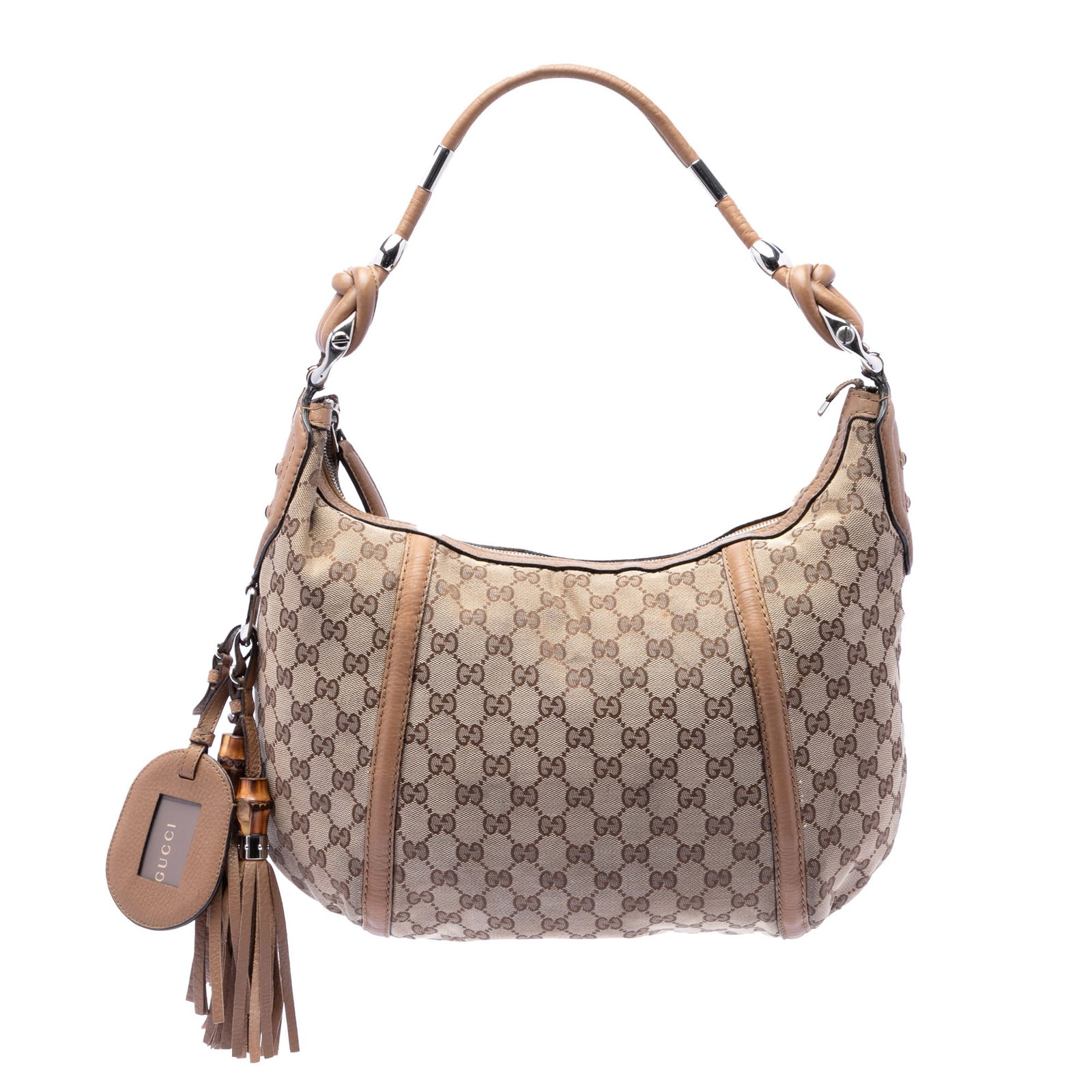 Gucci GG Canvas Hobo Bag with Horsebit Trim: Gucci GG Canvas Hobo Bag with Horsebit Trim This Gucci GG Canvas Techno Horsebit Hobo features a beige canvas body with leather trim, a flat leather strap, and a top zip closure. The interior is equip