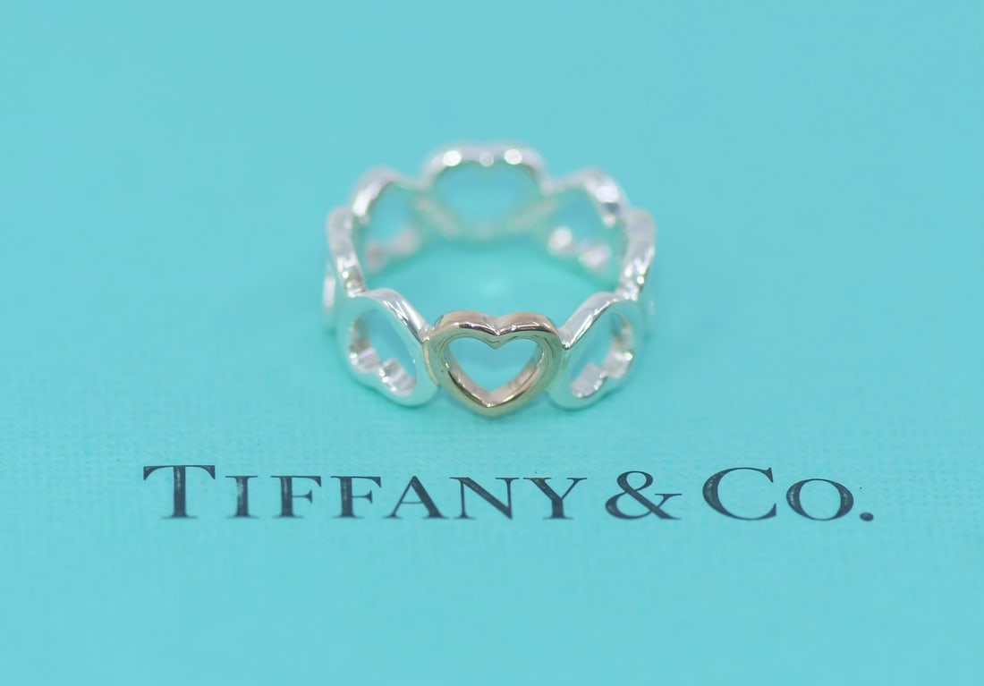 Tiffany & Co Paloma Picasso Sterling Silver Heart Ring Size 5 Authentic: Tiffany & Co Paloma Picasso Sterling Silver Heart Ring Size 5 Authentic This exquisite heart-shaped ring from Tiffany & Co. showcases the artistry of Paloma Picasso. Crafted from high-quality sterling