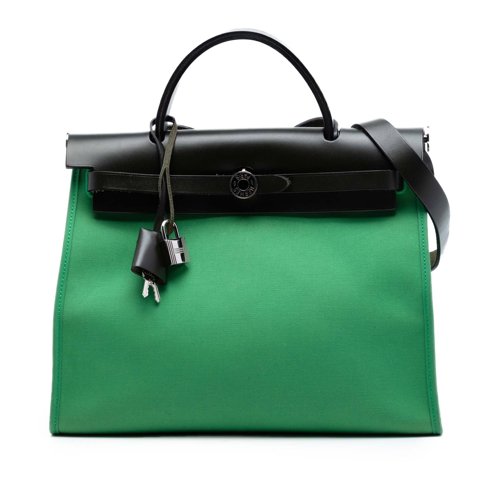 Herbag Zip 31 Green Canvas Shoulder Bag with Leather Trim by Hermes: Herbag Zip 31 Green Canvas Shoulder Bag with Leather Trim by Hermes The Hermes Toile Herbag Zip 31 is crafted with a canvas body accented by leather trim. It features a flat leather top handle, a flat