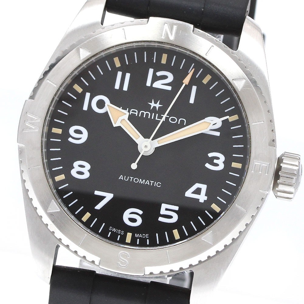 Hamilton Khaki Field Expedition Automatic Men's Wristwatch H702250: Hamilton Khaki Field Expedition Automatic Men's Wristwatch H702250 This pre-owned Hamilton Khaki Field Expedition men's wristwatch features a stainless steel case and a black dial, complemented by a r