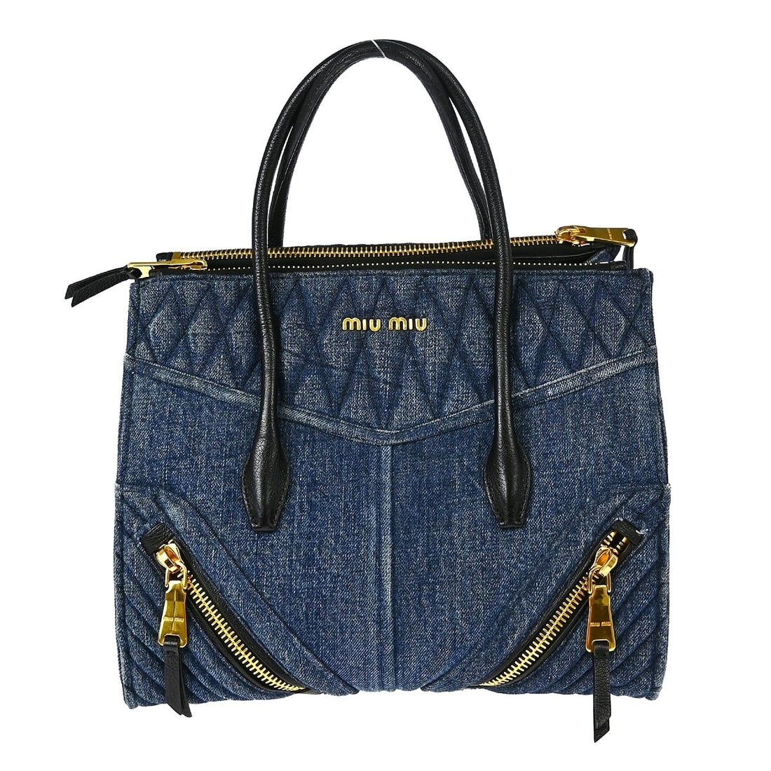 Miu Miu Vintage Blue Denim Biker Handbag Matelasse Finish: Miu Miu Vintage Blue Denim Biker Handbag Matelasse Finish This Miu Miu Blue Denim Biker Handbag combines vintage charm with modern style. Crafted from durable denim, this medium-sized top handle bag f