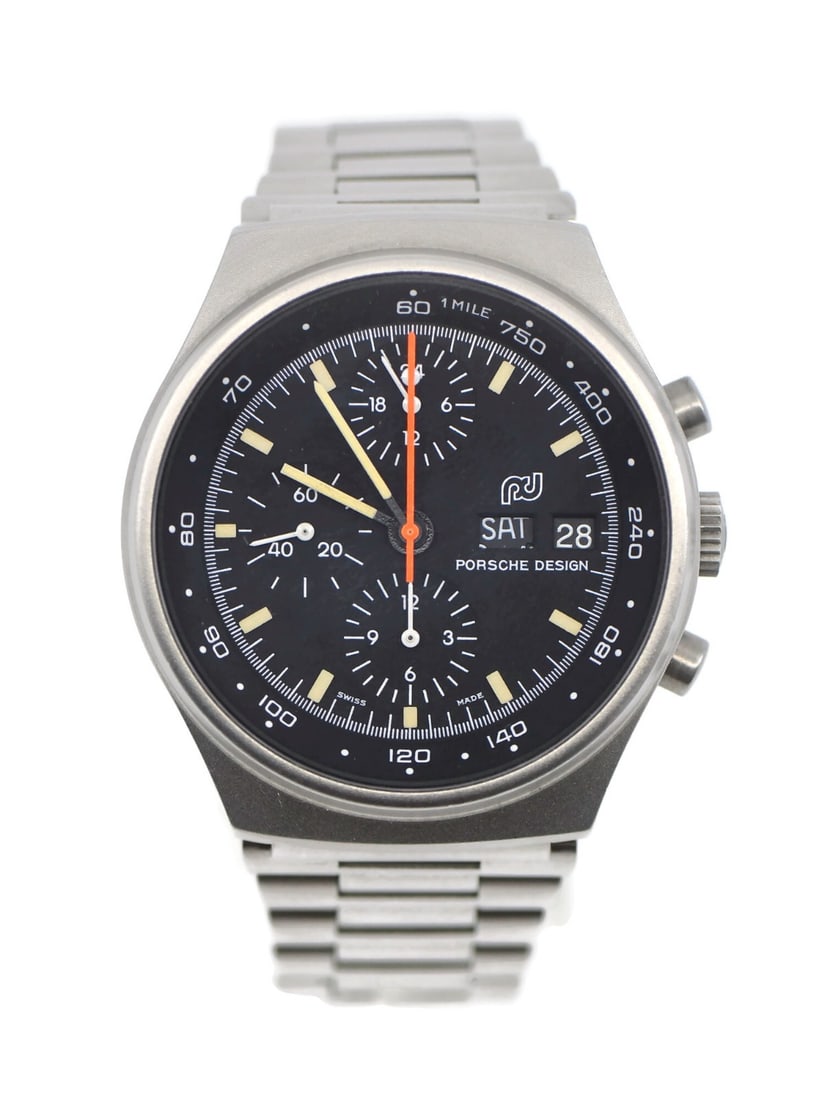 Porsche Design Chronograph Automatic Steel Wristwatch Ref 7176S: Porsche Design Chronograph Automatic Steel Wristwatch Ref 7176S This Porsche Design Chronograph wristwatch features a stainless steel case and band, with a black analog dial. Designed for men, it is e