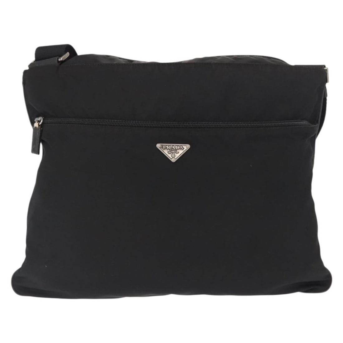 Prada Tessuto Black Nylon Unisex Messenger Bag with Front Pocket: Prada Tessuto Black Nylon Unisex Messenger Bag with Front Pocket This Prada Front Pocket Messenger Bag is crafted from durable black nylon and designed for unisex use. It features a practical front po